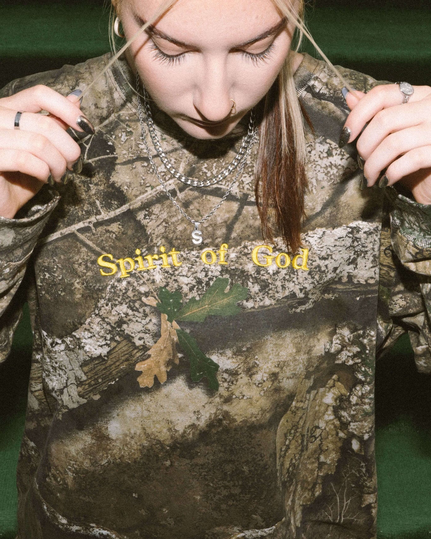 woman wearing camo long sleeve christian shirt in atlanta, georgia