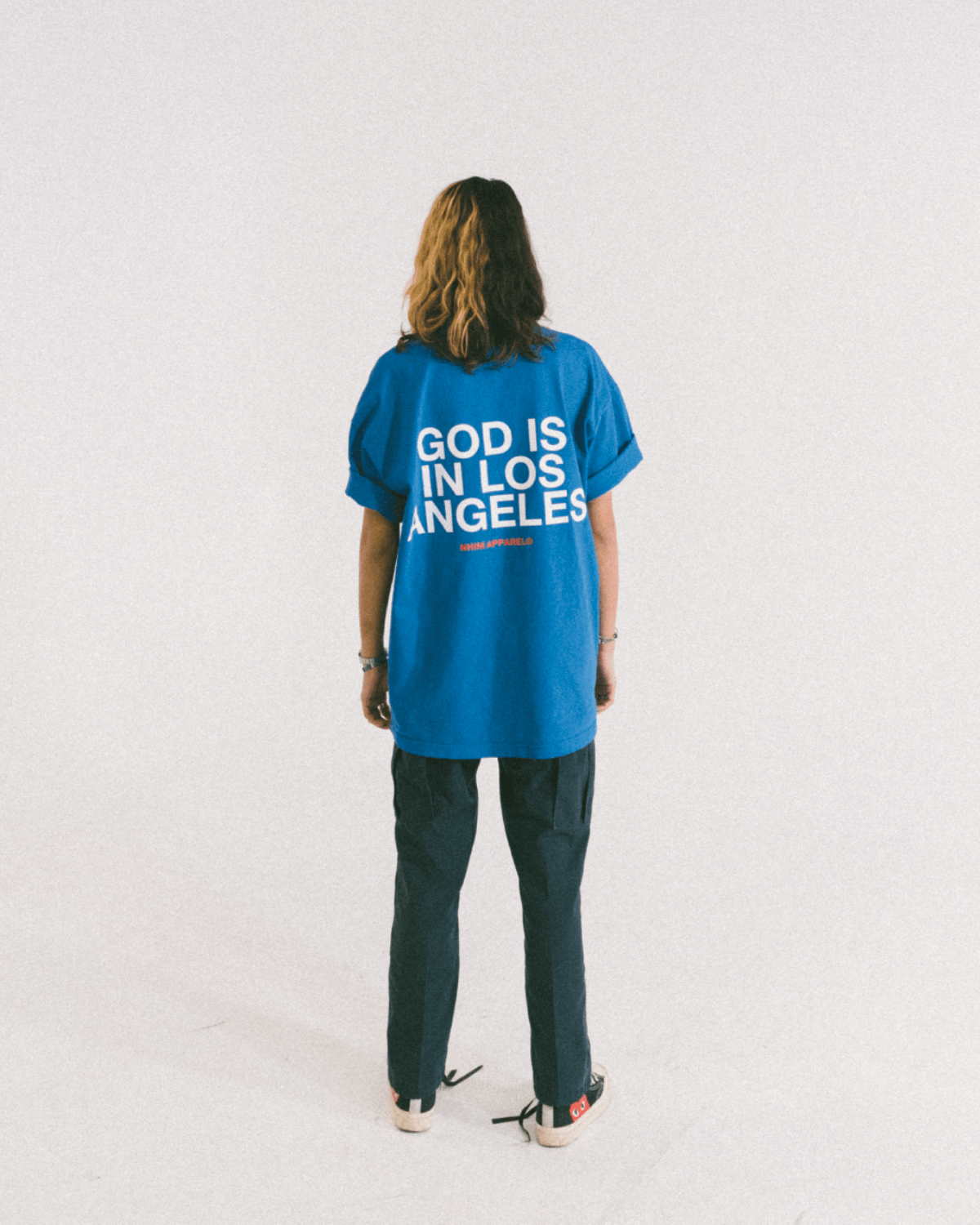 The God Is In Los Angeles Shirt is a premium garment dyed, ethically sourced and made in the USA T-shirt made by NHIM Apparel Christian clothing brand.