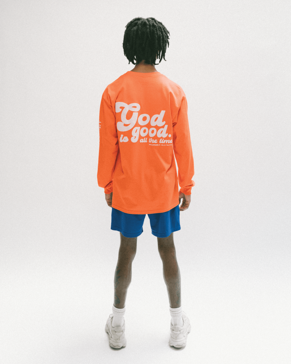 God is Good! God is good all the time Christian long-sleeve orange shirt. puff print. Nhim Apparel Christian clothing company, a place for t-shirts and prayer.