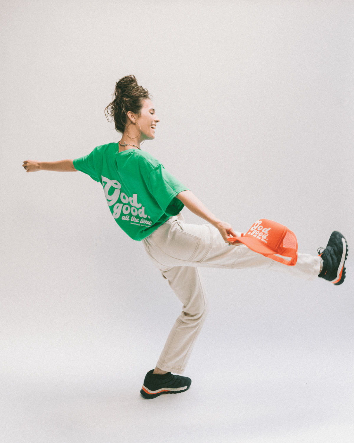 Christian hat. Christian t shirt. God is good all the time. Orange trucker hat. Green t shirt. NHiM Apparel.
