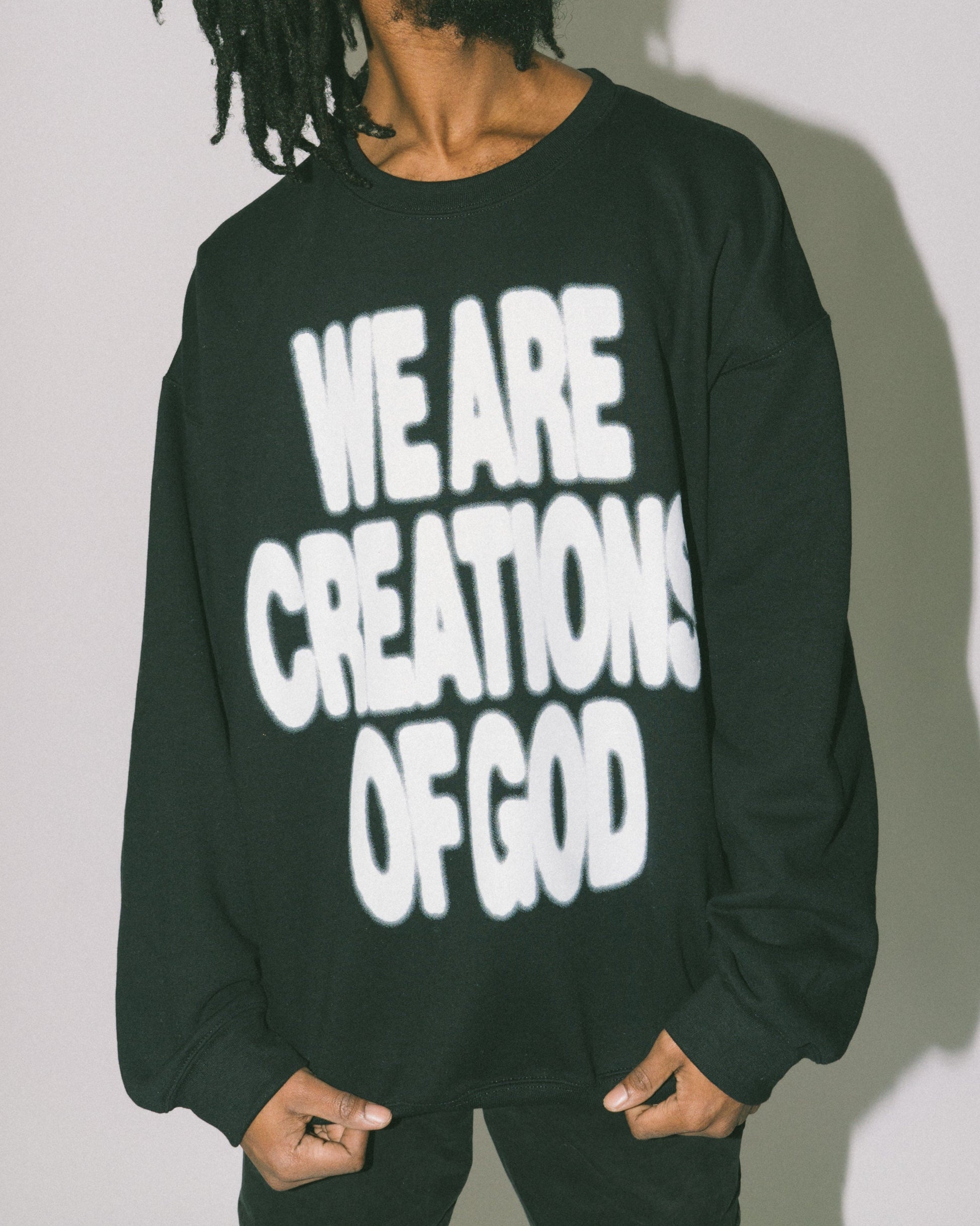 We are creations of God black crew sweatshirt by NHIM Apparel Christian clothing brand