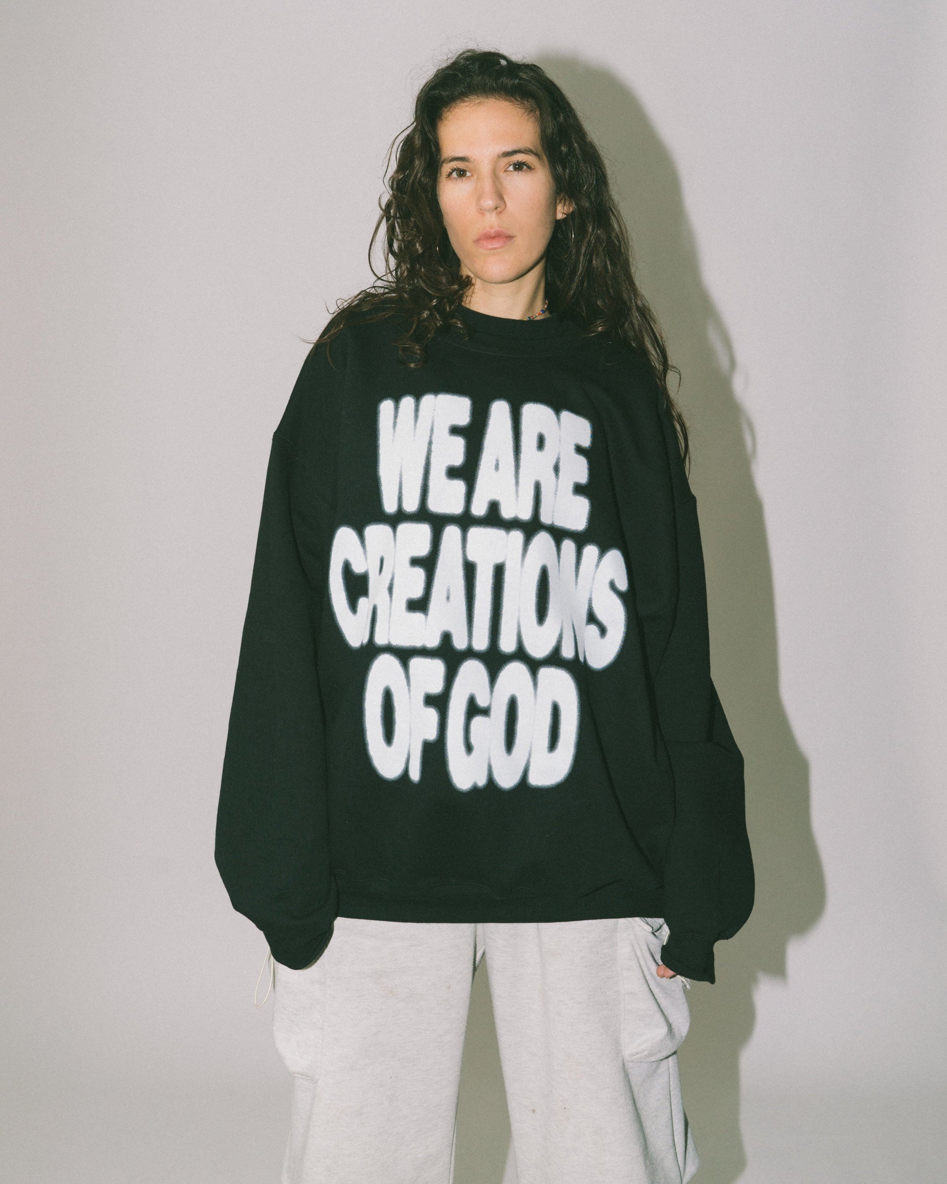 We are creations of God black crew sweatshirt by NHIM Apparel Christian clothing brand