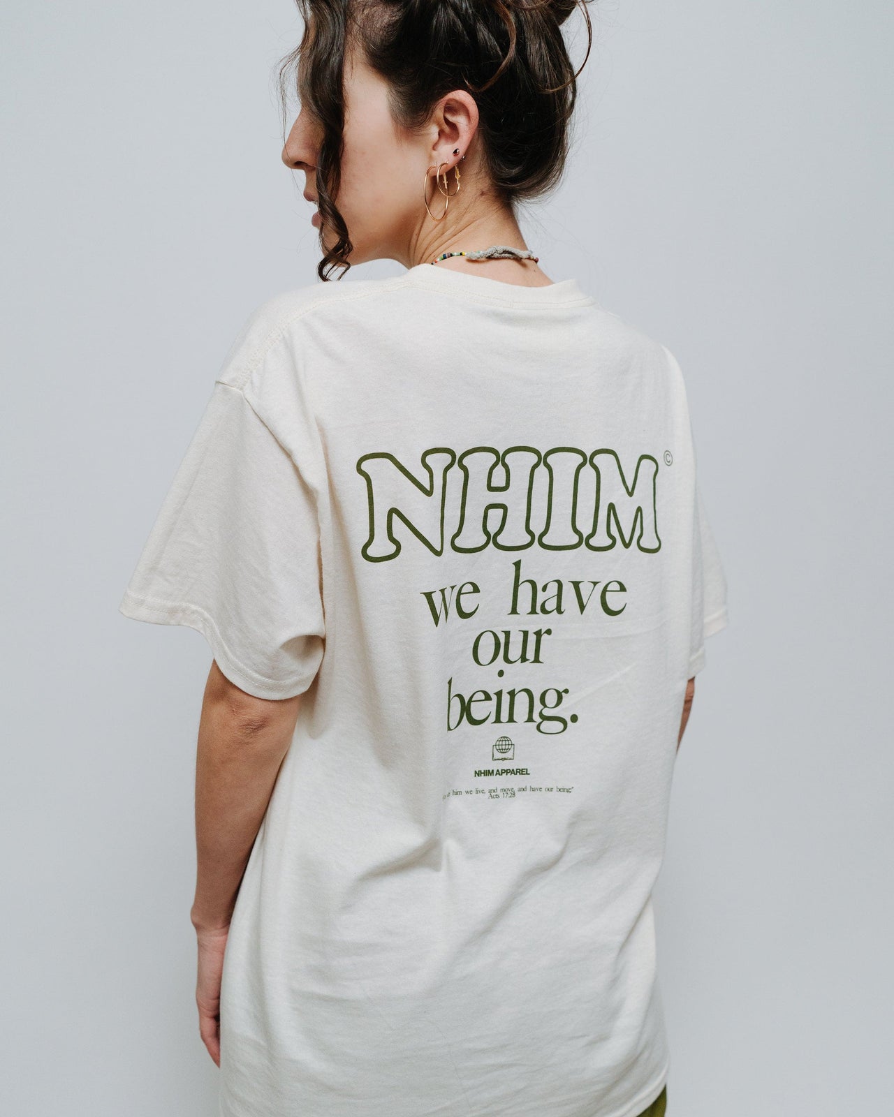 NHIM We have our being natural shirt by NHIM apparel christian clothing brand The name "NHIM" comes from Acts 17:28: “For in Him we live and move and have our being". A collection inspired by our beginnings. Made in the USA