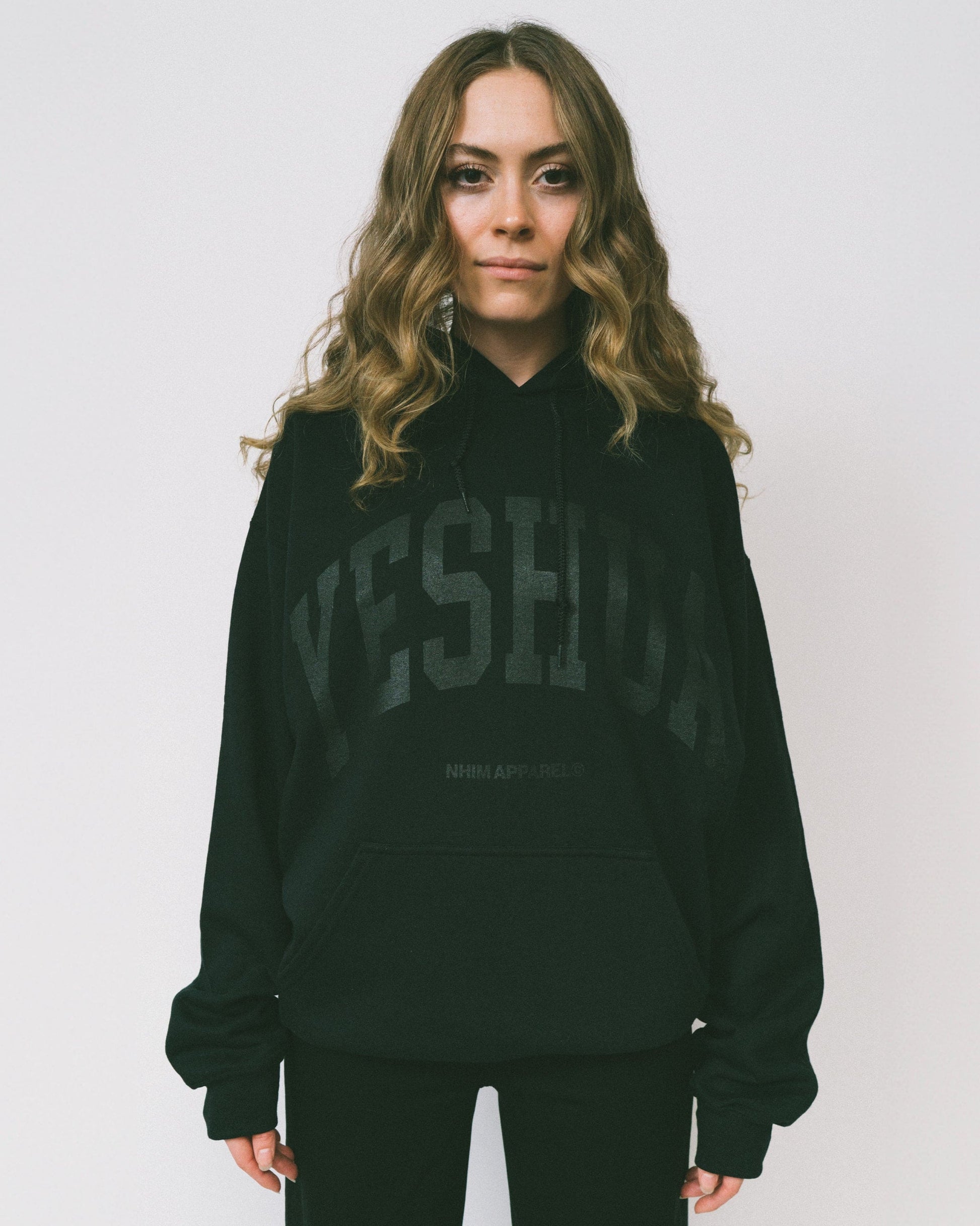 Yeshua hoodie YESHUA logo black hooded sweatshirt made by NHIM APPAREL christian clothing brand
